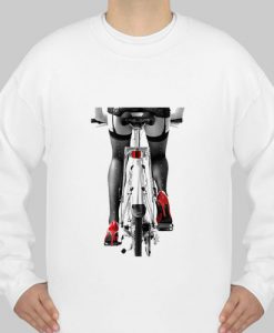 Sexy woman in red high heel shoes and stockings riding bicycle sweatshirt Ad
